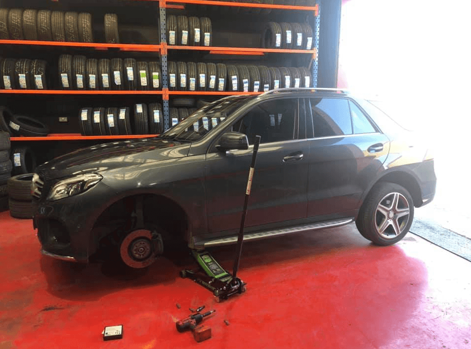 Mechanic working on a car
